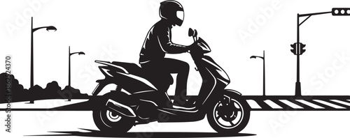 A person riding a scooter through a city street at night