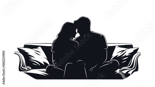 Couple sitting together on sofa at home