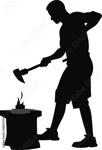 Silhouette Of A Blacksmith Hammering Hot Metal