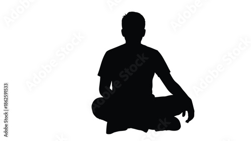 A person sitting in a meditative pose a striking black silhouette