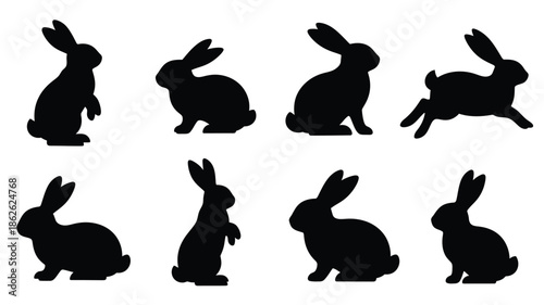 A collection of black rabbit silhouettes in various poses and arrangements