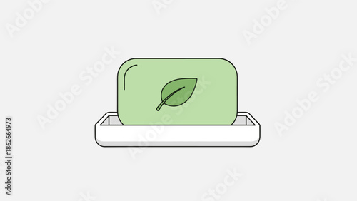 Natural green soap bar with a leaf logo on a white dish representing organic, herbal, and eco-friendly personal care.