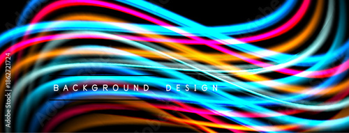 Vibrant colorful lines flow across black background. Dynamic abstract waves create modern design element. Bright illumination enhances visual impact.