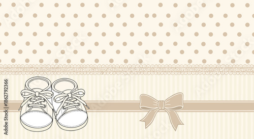 Elegant baby frame featuring vintage style shoes and a delicate bow on a soft polka dot and striped beige and cream background.