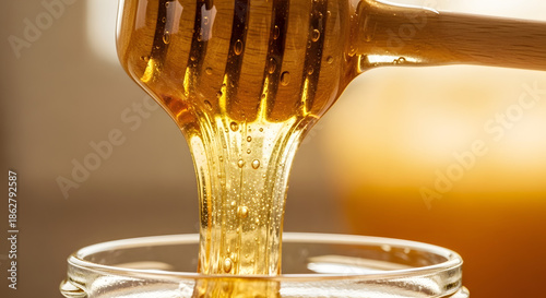honey dripping from a spoon