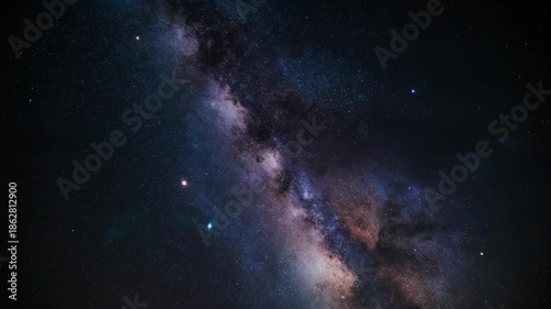 A vibrant nighttime view of the Milky Way, filled with stars and cosmic clouds
