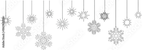Elegant collection of delicate hanging snowflakes, perfect for winter holiday decorations, festive backgrounds, and seasonal design projects, evoking a serene and frosty atmosphere