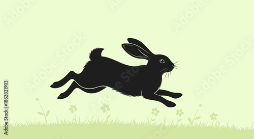 Elegant black rabbit silhouette bounding across a lush green meadow illustration