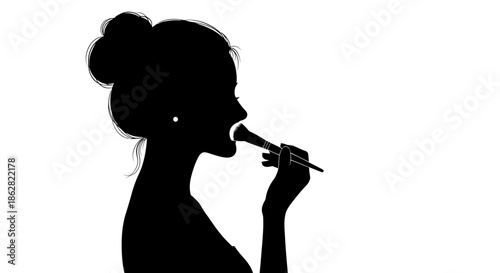 Silhouette of woman applying makeup with brush in elegant beauty routine scene