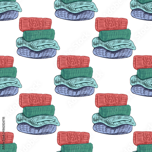 Hand drawn vintage seamless pattern of folded knitted sweaters in color version, warm winter woolen clothes stack