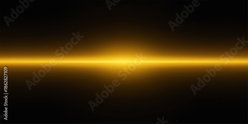 Bright yellow light beam shining on dark background