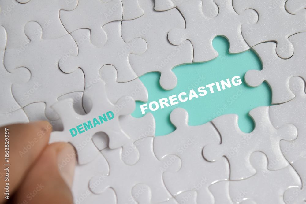 Fototapeta premium Piece of jigsaw puzzle with word demand forecasting. Business and finance concept