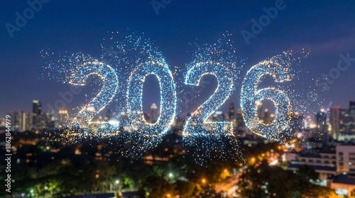 Sparkling 2026 New Year's celebration over cityscape at night