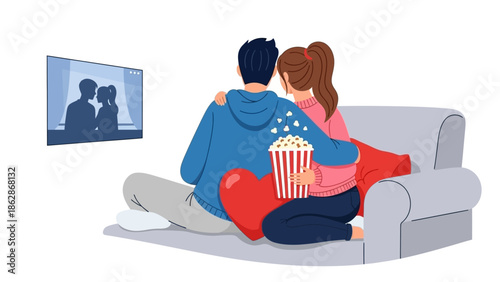 Couple watching romantic movie at home with popcorn on couch