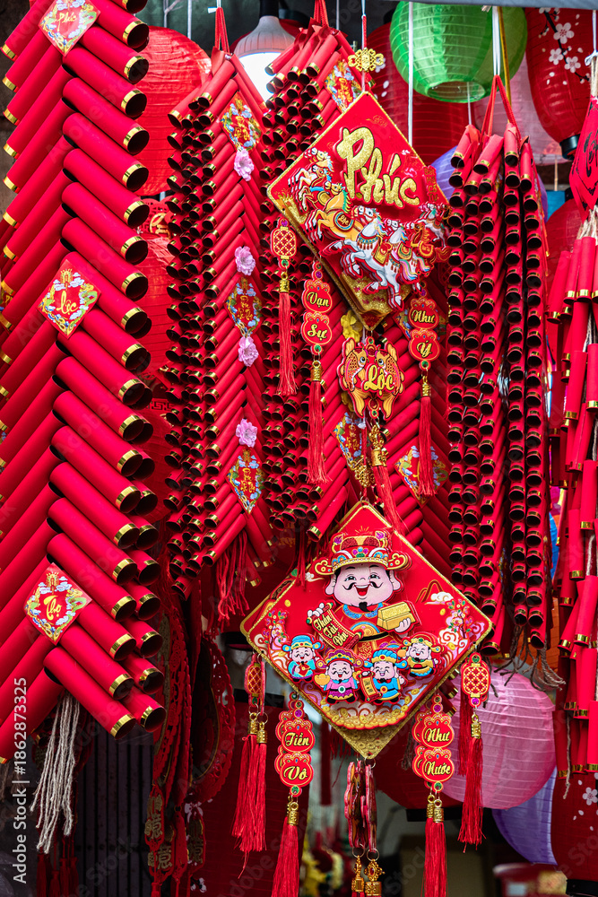 Obraz premium Hàng Mã Street, Hanoi comes alive with Lunar New Year decorations for the Year of the Horse, featuring traditional red and gold ornaments symbolizing luck, prosperity, and celebration.