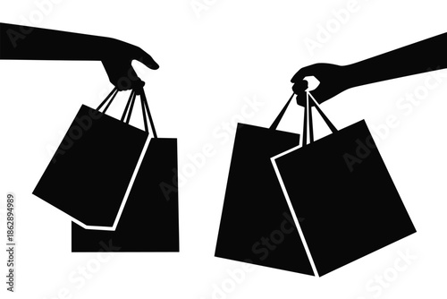 Silhouettes of two hands holding shopping bags symbolize successful.