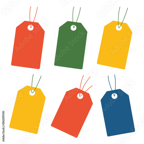 Set of six blank retail price tags hang ready for product labeling.