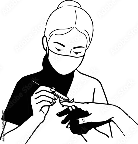 A person in a face mask files another person's fingernail with a tool