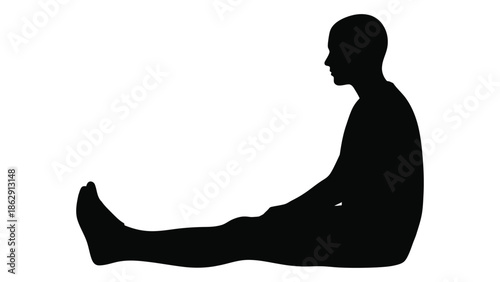 Silhouette of a man seated in a relaxed contemplative pose