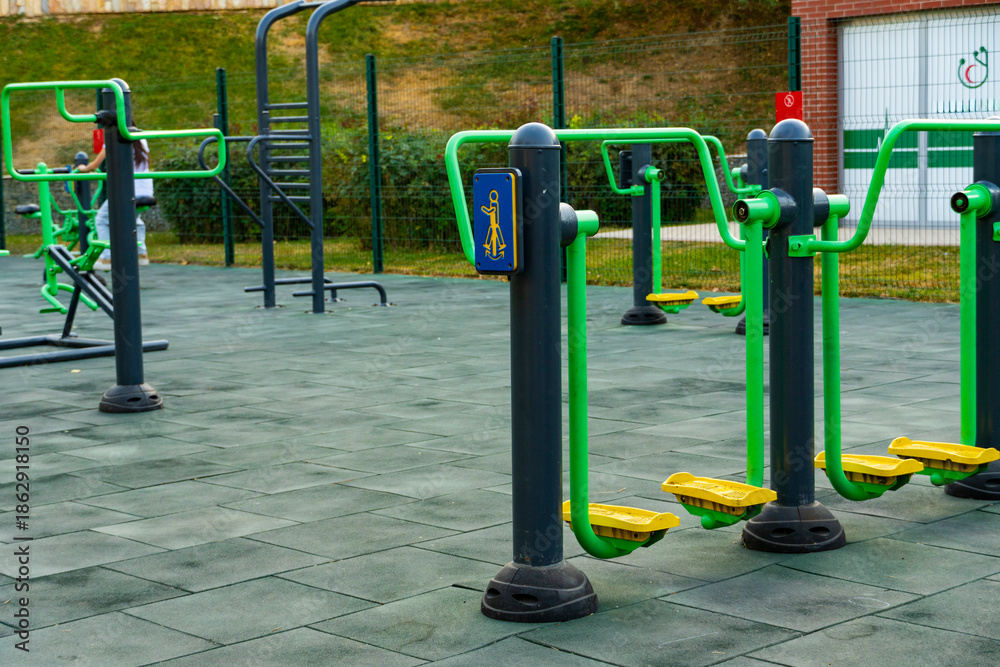 Fototapeta premium Outdoor fitness park with modern exercise equipment