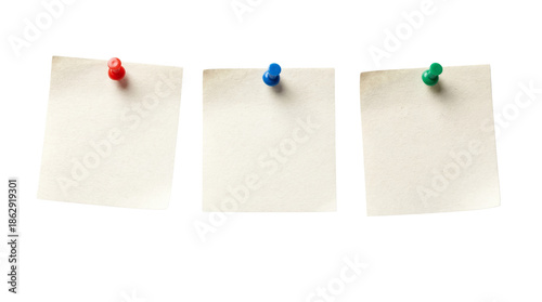 Three Blank Beige Square Sticky Notes Pinned with Red, Blue, and Green Pushpins on White Background