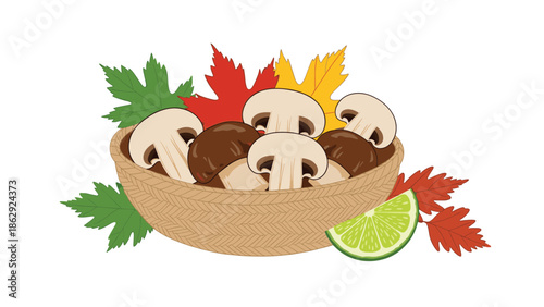 Basket full of fresh brown mushrooms and white button mushrooms decorated with colorful autumn maple leaves and a bright lime slice on a white backdrop.