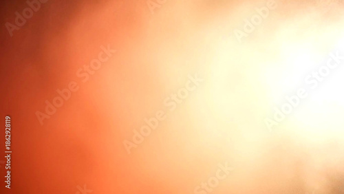 Vibrant Orange Fog with Bright Light Emission from the Right Side