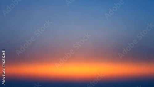 Vibrant Sunset Over the Horizon with Fiery Skies and Serene Landscape