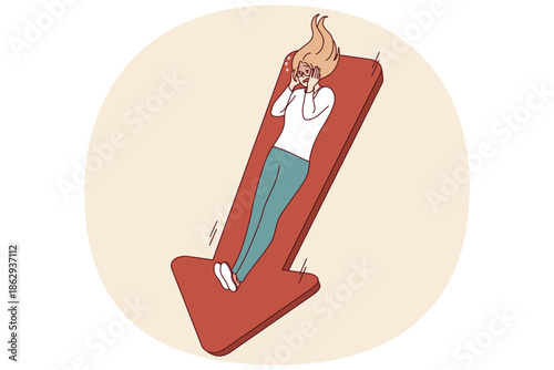Frightened woman suffering from falling income and risk of bankruptcy, lying on down arrow. Danger of bankruptcy and sharp reduction in salary for girl is caused by financial crisis