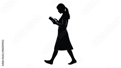 Silhouette of a woman reading a book a moment of quiet contemplation