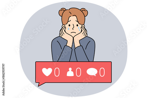 Girl is sad because of digital addiction and lack of subscribers and likes on social networks or personal blog. Crying child needs psychotherapy due to digital addiction causing depression
