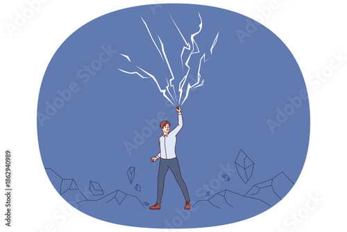 Powerful business man raises hand up near lightning bolts, demonstrating self-confidence and superpowers. Powerful entrepreneur is not afraid of natural anomalies and cataclysms that cause awe