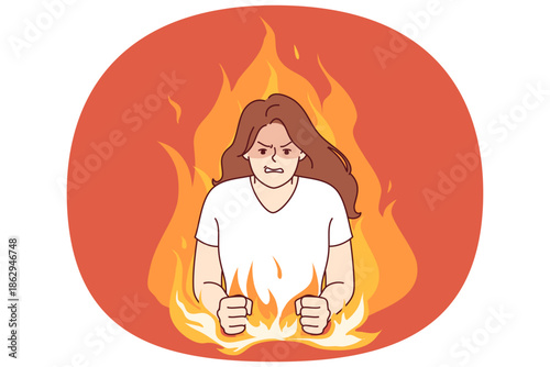 Nervous woman experiencing aggression due to psychological problems, standing in middle of burning flame. Girl aggression and disappointment are caused by bad character and defensiveness.
