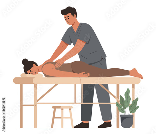 Male therapist giving back massage to female patient on table