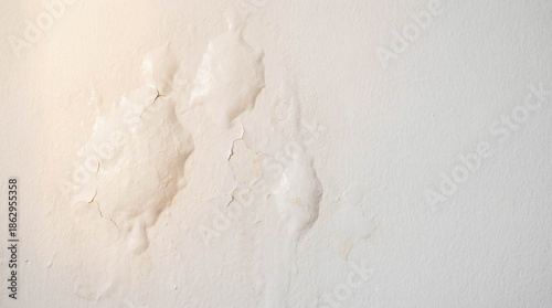 Bubbling paint on wall from hidden water leak moisture damage house maintenance problem repair accident emergency home insurance claim renovation interior background texture