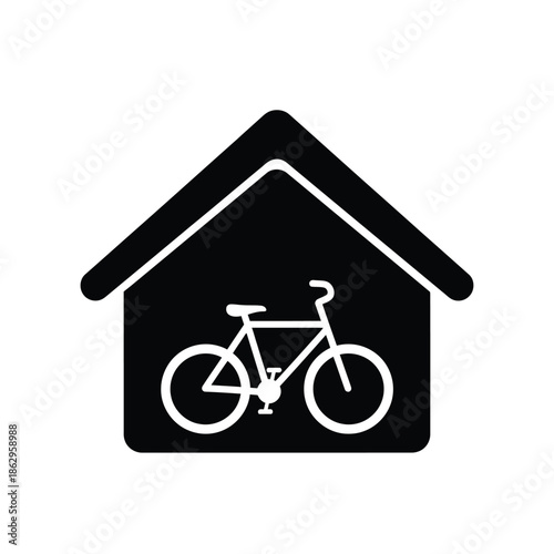 Black house with white bicycle inside silhouette