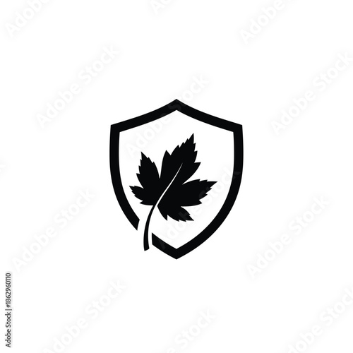 Black shield with maple leaf white