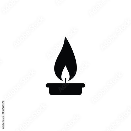 Black silhouette of a candle flame white