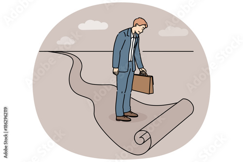 Business man standing at end of path, as metaphor for limitations in career growth and dead end in professional development. Businessman stands confused on ending path and needs career advice
