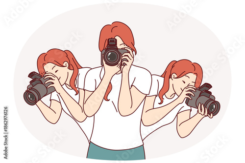 Woman photographer holds professional camera to create photo reports and looks in different directions. Young girl photographer working for magazine or mass media outlet takes pictures.