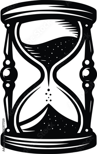 A vintage hourglass with flowing sand symbolic of time passing
