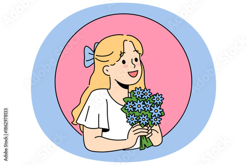 Little girl with bouquet of wildflowers smiles, rejoicing at change of season or preparing flowers for mother day. Child holds beautiful flowers found in field and enjoys aroma and beauty of buds