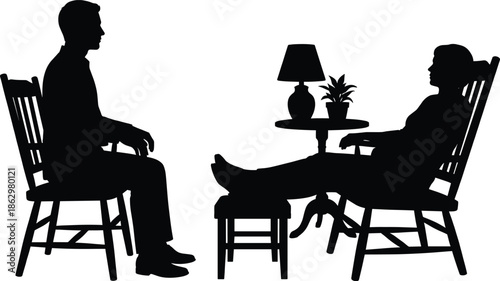 Man and woman silhouette sitting in living room chairs with table lamp plant, counseling therapy interview concept, black isolated figures