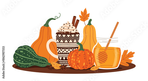 Cozy autumn composition featuring pumpkins, a cup of hot chocolate with whipped cream, and a jar of honey on a dark background.