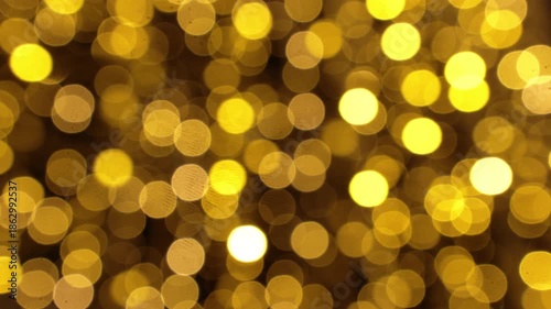 Warm glowing dots of golden bokeh produce a magical, celebratory mood, suitable for event posters, greeting headers, social media graphics and elegant festive branding.
