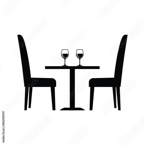 Two wine glasses on table silhouette