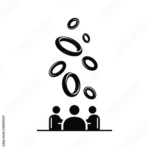 People sitting at table with rings falling