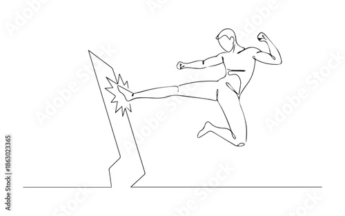 Dynamic man kicking computer screen in frustration and anger