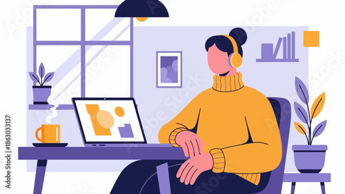 Remote worker wearing headphones sitting at desk with laptop and coffee