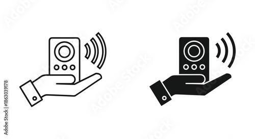 Hand holding portable wireless speaker